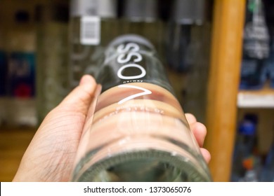 Huntington Beach, California/United States: 04/07/2019: A Hand Holds A Bottle Of Voss Water