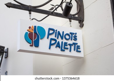 Huntington Beach, California/United States: 04/07/2019: A Store Front Sign For The Wine And Paint Studio Franchise Known As Pinot's Palette