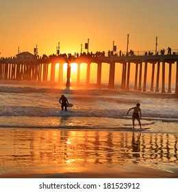 the Huntington Beach pier under sunset 