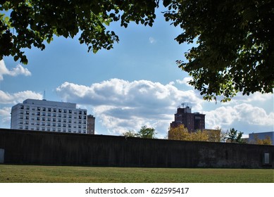 Huntington, WV, Viewed From Behind The Wall Of A Waterfront Park.