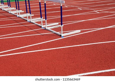 Hurdle Bracket On Red Plastic Runway