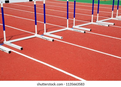 Hurdle Bracket On Red Plastic Runway