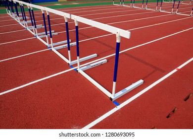 Hurdle Bracket On Red Plastic Runway