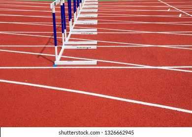 Hurdle Bracket On Red Plastic Runway