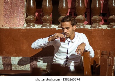 Hurghada, Egypt - November 2 2018: Arab Man, Egyptian Male Drinking Tea At The Terrace