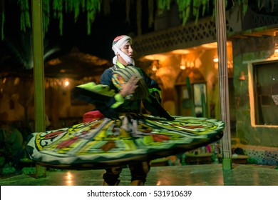 HURGHADA, EGYPT - NOVEMBER 27, 2016: Sufi whirling is a form of Sama or physically active meditation which originated among Sufis, which is still practiced by the Sufi Dervishes of the Mevlevi order.