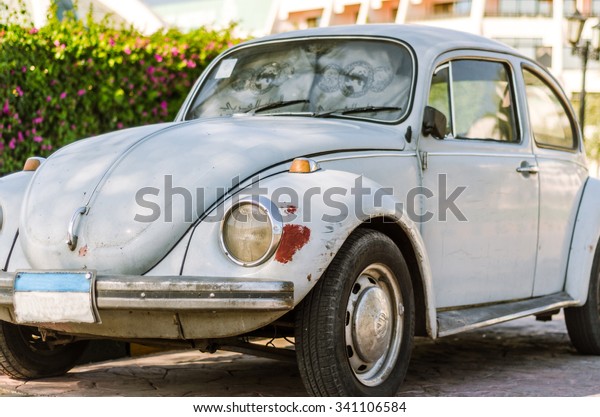 Hurghada, Egypt - October 27, 2015: VW Beetle\
parked on the street