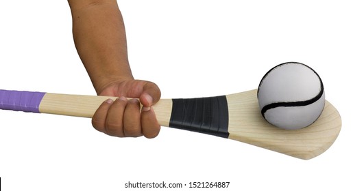 Hurley Ball And Hurley Stick Bats In Hands Isolated On White Background. This Has Clipping Path.