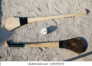 Hurls And Sliotar On Gravel, Gaelic Games