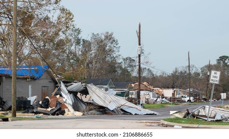 Hurricane Damage In Louisiana To A Neighborhood And Street. 