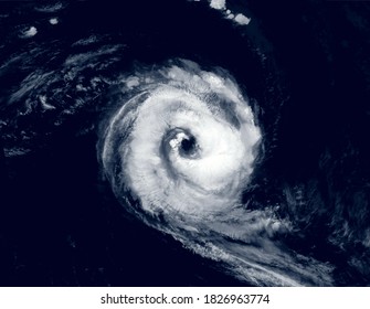 Hurricane Eye Over Sea In Satellite Photo, View Of Tropical Storm Or Cyclone From Space. Concept Of Weather, Typhoon, Disaster, Satellite Picture And Warning. Elements Of This Image Furnished By NASA