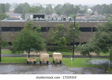 Hurricane Gustav Winds And Rain Batter Military Vehicles And Trees In New Orleans, Louisiana.