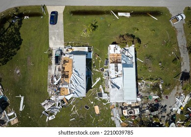 Hurricane Ian Destroyed Homes In Florida Residential Area. Natural Disaster And Its Consequences