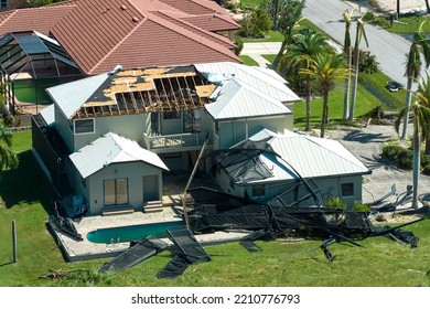 Hurricane Ian destroyed house in Florida residential area. Natural disaster and its consequences - Shutterstock ID 2210776793