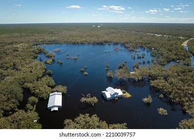 Hurricane Ian Flooded Houses In Florida Residential Area. Natural Disaster And Its Consequences