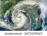 Hurricane Isaac. The storm was expected to make landfall on the anniversary of Hurricane Katrina, while marching straight up the Mississippi Riv Elements of this image furnished by NASA.