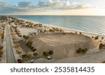 Hurricane Milton aftermath cleanup. Piles of sand at Charlotte County sand recipient site at Englewood Beach on Manasota Key.