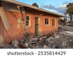 Hurricane Milton consequences in Manasota Key, Florida. Destroyed house on sea coast. Storm surge severe damage