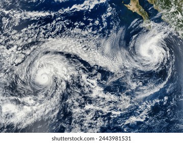 Hurricane Otis 15E and Tropical Storm Norma 17E in the eastern Pacific Ocean. Hurricane Otis 15E and Tropical Storm Norma 17E in. Elements of this image furnished by NASA. - Powered by Shutterstock