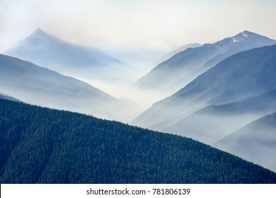 Hurricane Ridge Fire - Olympic National Park is a gem. This particular day we witnessed a wildfire engulfing parts of the ridge. It created however a nice heavy smog that settled across the valley.