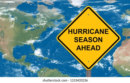 Hurricane Season Ahead Caution Sign With Satellite Map Background