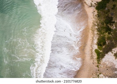 Hurricane Waves Eroding A Beach In New England