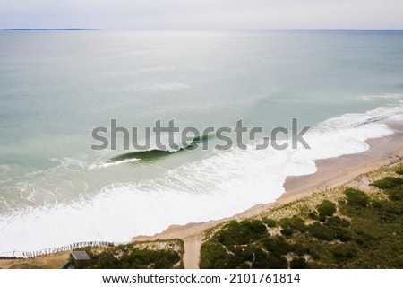 Hurricane Waves eroding a beach in New England