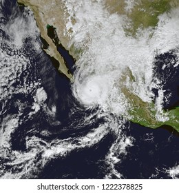 Hurricane Willa Closes in on Mexico. The category 3 hurricane was expected to bring strong winds, heavy rainfall, and a storm surge to Mexico. Elements of this image furnished by NASA. - Powered by Shutterstock