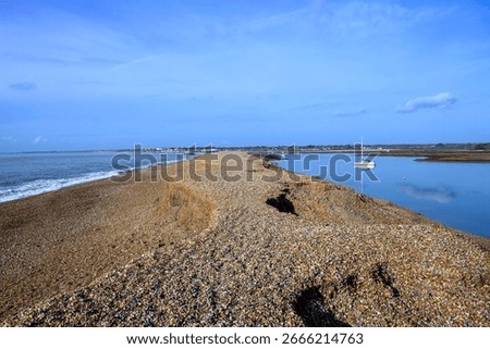 Hurst Spit a hook shaped shingle spit at Milford on Sea leading to Hurst Point Light House and Castle