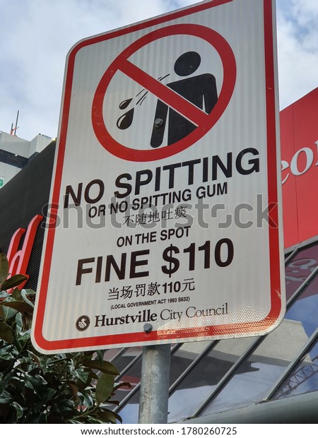 Hurstview, Australia, NSW. 18/07/2020.
Editorial. Street Sign No spitting or no spitting gum on the spot.
Fine $110 dollars.