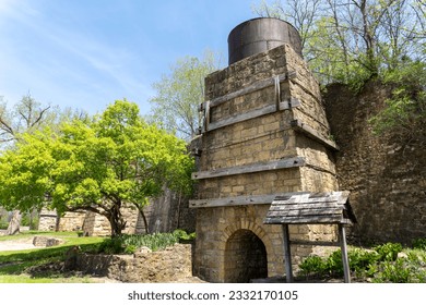 Hurstville Lime Kilns in Maquoketa, Iowa. Four kilns heated limestone rock mined from nearby quarries. Process formed lime mortar used in  construction midwest buildings in 1870 - 1920s. 