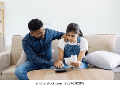 husband comforting stress wife sit on couch read financial papers invoices troubled with too high expenses utility - Shutterstock ID 2359610205