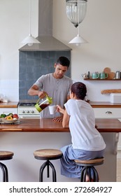 Husband Is Pouring Coffee For His Wife In Kitchen Early Morning Breakfast Routine