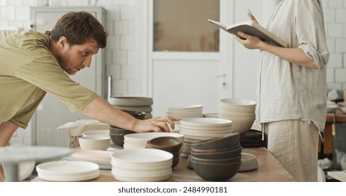 Husband and Wife Creating Ceramic Bowls in Their Artisan Workshop - Powered by Shutterstock
