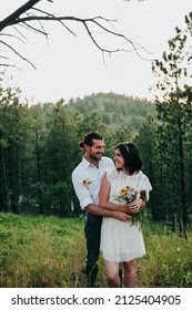 Husband And Wife Embrace In The Black Hills National Forest