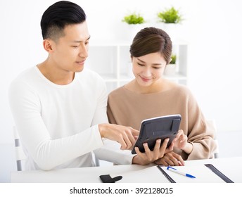 Husband And Wife With Family Finance Concept