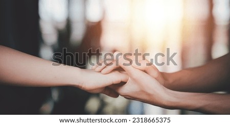 Husband and wife join hands to cheer ,Relationship care concept ,comforting family members ,mutual encouragement ,tenderness ,comfort and sympathy ,helping ,giving hope and believing