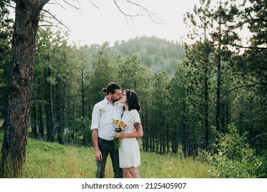 Husband And Wife Kiss In The Black Hills National Forest