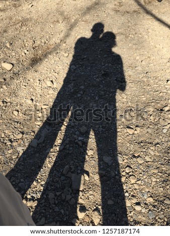 Similar – Shadow of a woman on the beach