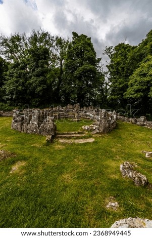 hut circle in Remains of Din Lligwy, or Din Llugwy ancient village, Near Moelfre, Anglesey, North Wales, UK, portrait, wide, angle, entrance in foreground, wideangle.