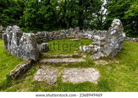 hut circle in Remains of Din Lligwy, or Din Llugwy ancient village, Near Moelfre, Anglesey, North Wales, UK, landscape, wide, angle, entrance in foreground, wideangle.