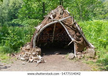 Hut or hovel made of animal skins and bones. Reconstruction of the human home of the Stone Bronze Age.