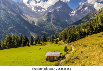 A hut in a mountain valley. Mountain hut. Hut in mountain valley. Mountain landscape