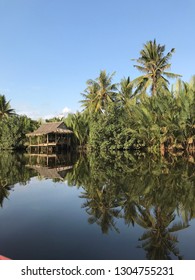 Hut reflection on the river
