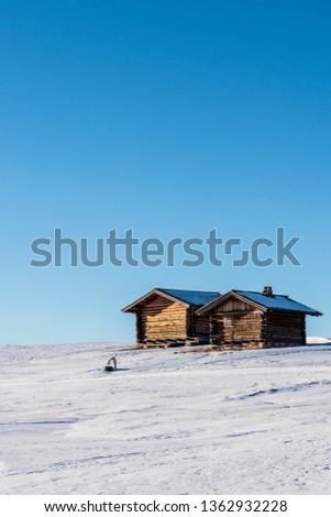 Similar – Mountain huts on green meadows in the Alps