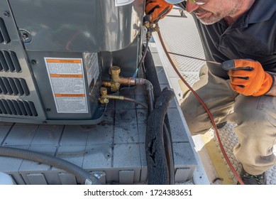 HVAC Contractor, Soldering In A New Condensing Unit Install