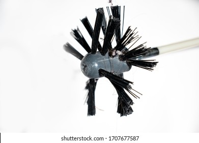 HVAC dryer vent cleaning brush isolated against a white background