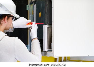 hvac filter replacement home central air system. servicemen changing filter in furnace. Change filter in rotary heat exchanger recuperator. - Shutterstock ID 2206822753