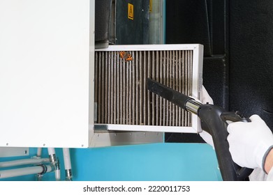 hvac filter replacement home central air system. servicemen changing filter in furnace. Change filter in rotary heat exchanger recuperator. - Shutterstock ID 2220011753