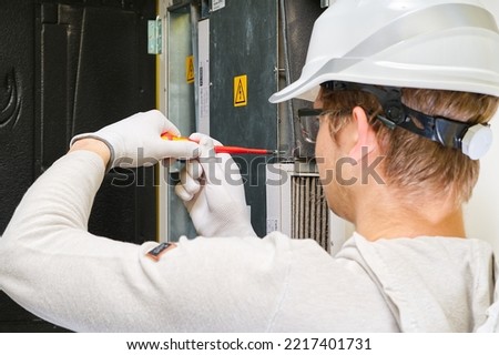 hvac filter replacement home central air system. servicemen changing filter in furnace. Change filter in rotary heat exchanger recuperator.